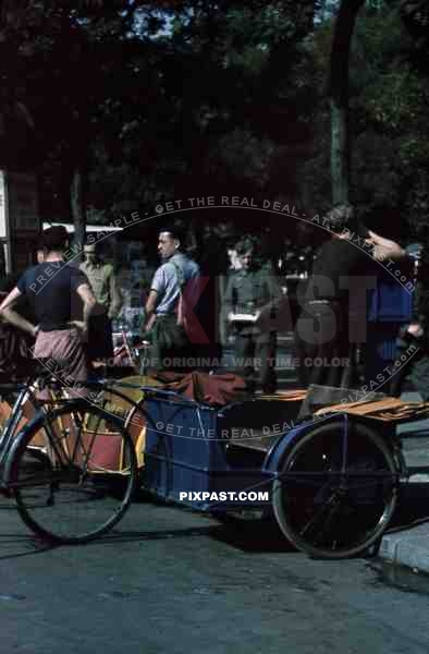 Paris France 1940 soldier bike taxi