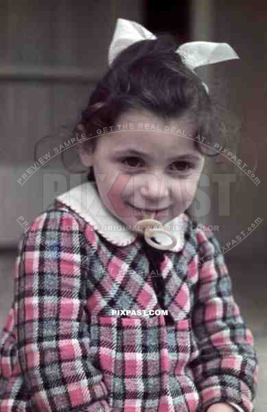 portrait of a little girl with a dummy, Germany 1938