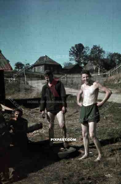 Repairing staff car flat tyre, Russian village, 10th Motorised infantry division repair werkstatt Bryansk 1941