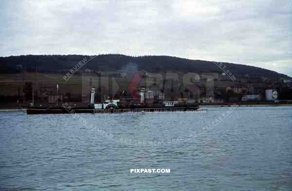 river paddle steamer on River Rhine, RÃ¼desheim, Hessen, 1939. Shell oil refinery.