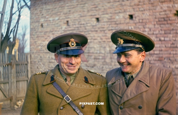 Romanian WW2 army officers in winter jackets having a good laugh. Romania November 1942