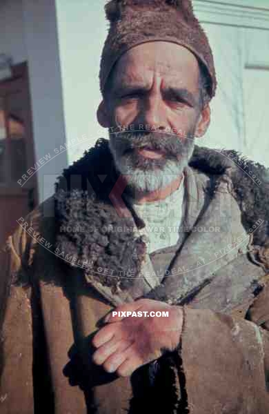 Russian farmer wearing local traditional winter cloths. Photographed by german war photographer Russia 1943.