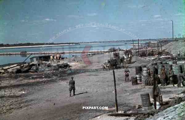 Russian POW Prisioners captured slave labour petrol depot river german officer Ukraine 1942