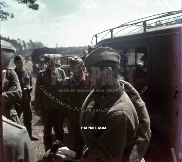 Russian POW soldier captured by German Communications troops on the Russian front 1941. Funk Radio Car.