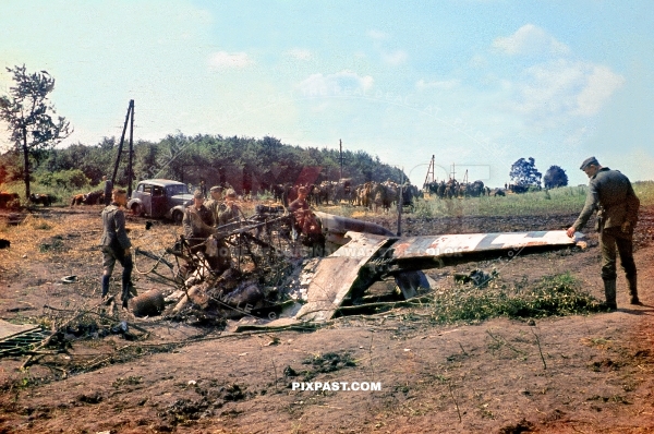 Soldiers of the 297 Infantry Division inspect crashed Russian fighter plane YAK9. Russia 1942