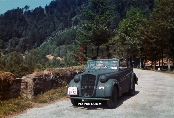 Two officers driving their Opel Olympia behind the Westwall. Wendlingen, Germany, 1939. 14th Infantry Division.