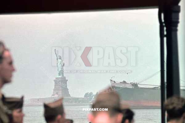 US soldiers returning from Europe after World War Two. Passing the Statue of Liberty. On board the liner SS George Washington