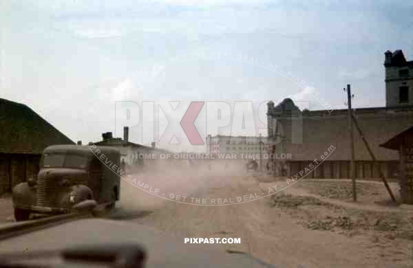 Ustiluh, Ukraine, Summer 1941, German Radio Car drive through dusty village, 94th Infantry Division.