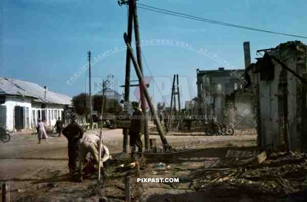 Ustiluh, Ukraine, Summer 1941, Invasion of Russia, road junction, kradmelder, destroyed city, 94. Infantry Division.