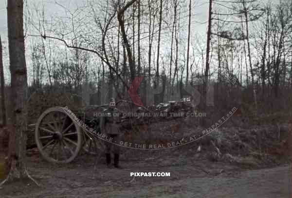 Wehrmacht soldier with fake cannon in Breisach, Germany ~1940