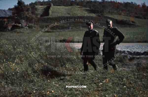 WW2 Color Norway - 2 German officers walking in Norwegian field medals iron cross Village