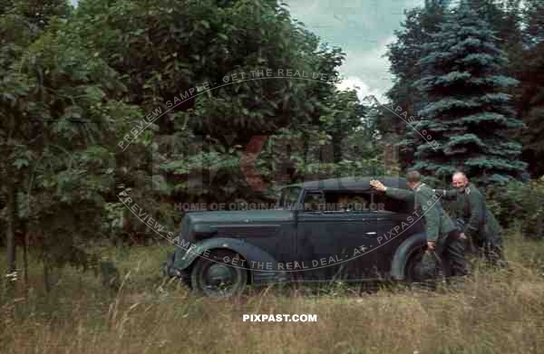 WW2 german officers pushing staff car outside Villa Holland 1940 summer